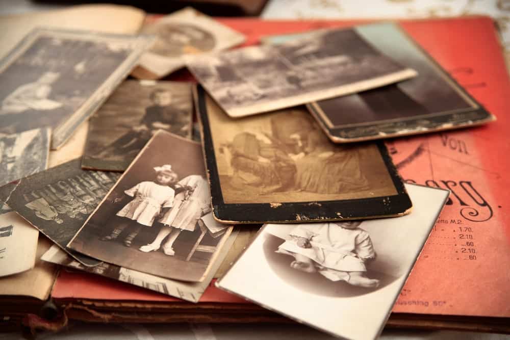 Old-family-photos-scattered-on-old-book