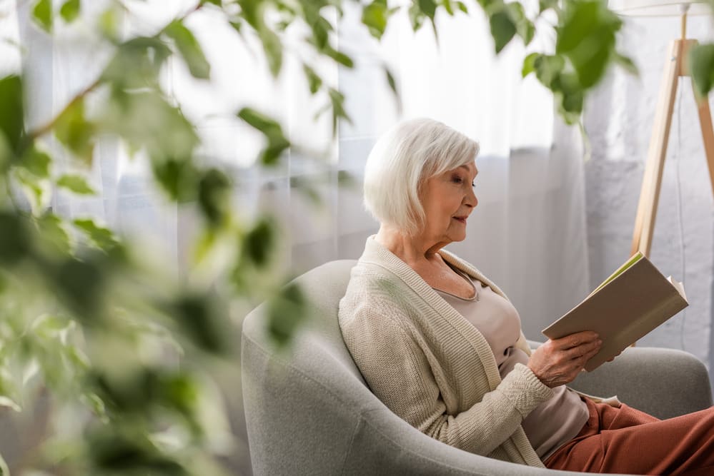 Senior-woman-reading-at-home