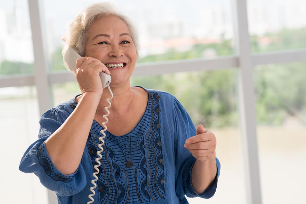smiling-senior-woman-talking-on-phone