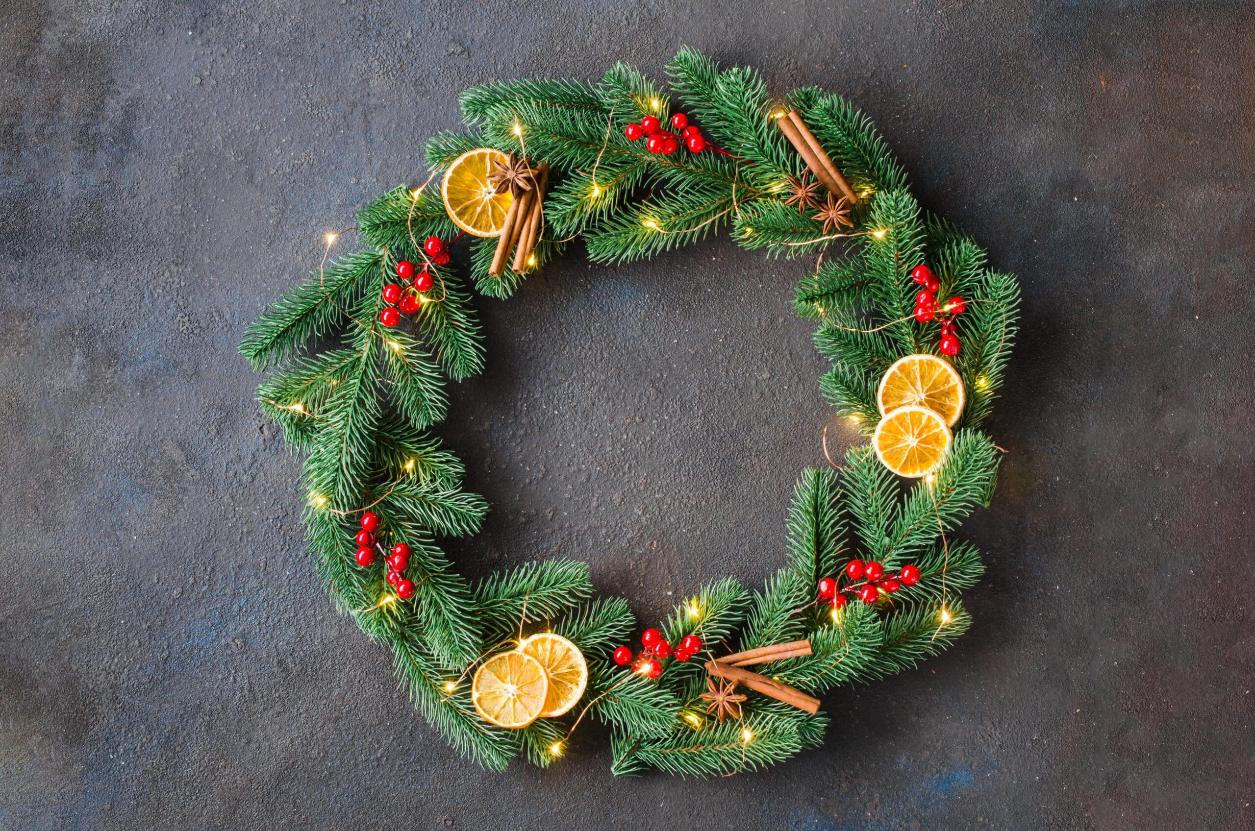 Winter wreath with orange slices and cinnamon sticks